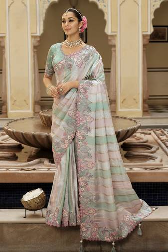 Exquisite designer silk saree with beautiful zari weave & heavy blouse work