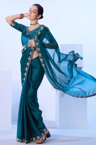 Teal embellished beads and stones saree with blouse