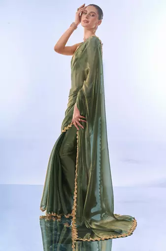 Green sequinned organza designer saree with blouse