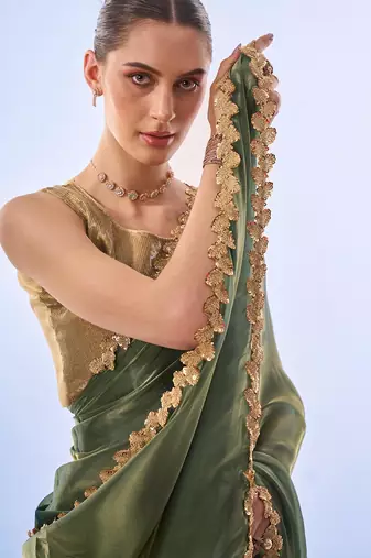 Green sequinned organza designer saree with blouse