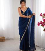 Teal embellished organza saree with blouse