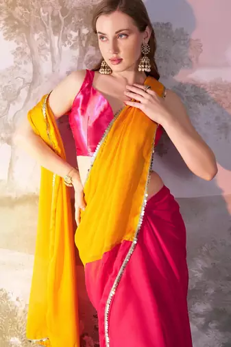 mustard and pink colourblocked designer georgette saree with blouse
