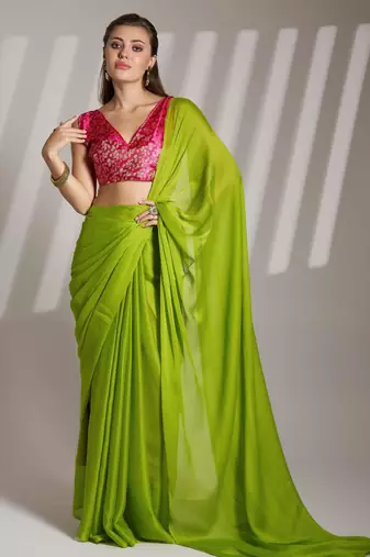 green chiffon saree with tassels and blouse