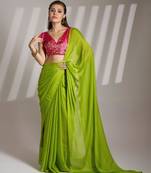 green chiffon saree with tassels and blouse