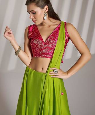 green chiffon saree with tassels and blouse 4