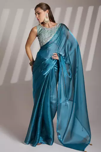 Teal blue solid organza saree with designer blouse piece