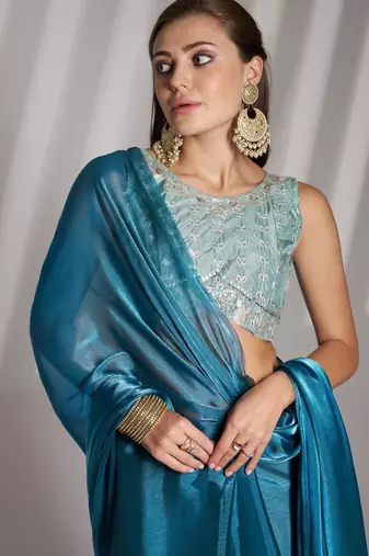 Teal blue solid organza saree with designer blouse piece