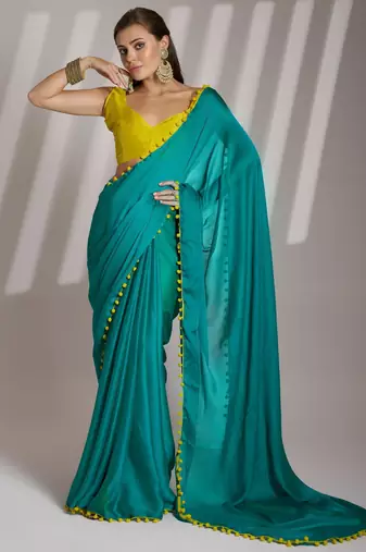 sea green solid chiffon saree with contrast blouse piece