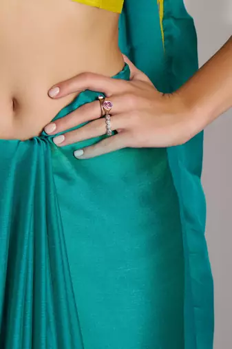 sea green solid chiffon saree with contrast blouse piece