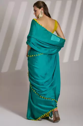 sea green solid chiffon saree with contrast blouse piece