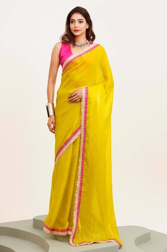 Yellow embellished designer lace satin saree with blouse