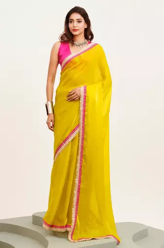 Yellow embellished designer lace satin saree with blouse