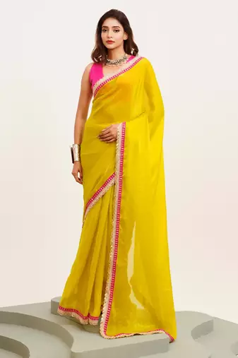 Yellow embellished designer lace satin saree with blouse