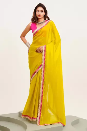 Yellow embellished designer lace satin saree with blouse