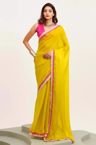 Yellow embellished designer lace satin saree with blouse