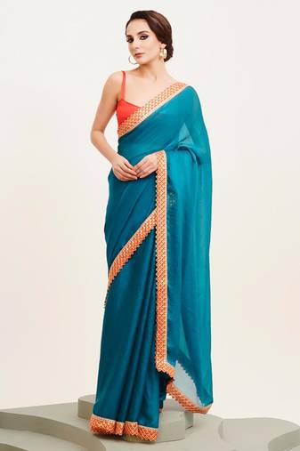 teal blue sequinned chiffon saree with blouse