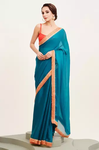 teal blue sequinned chiffon saree with blouse