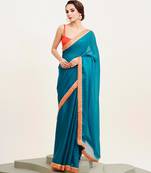 teal blue sequinned chiffon saree with blouse