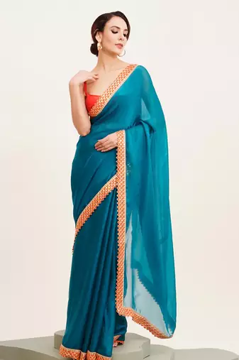 teal blue sequinned chiffon saree with blouse