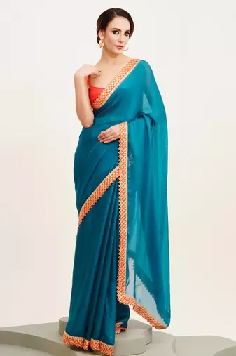 teal blue sequinned chiffon saree with blouse