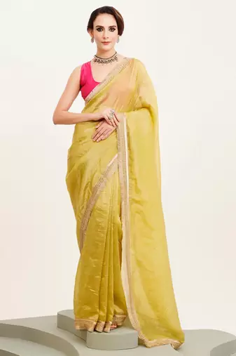 Yellow sequinned designer saree with blouse