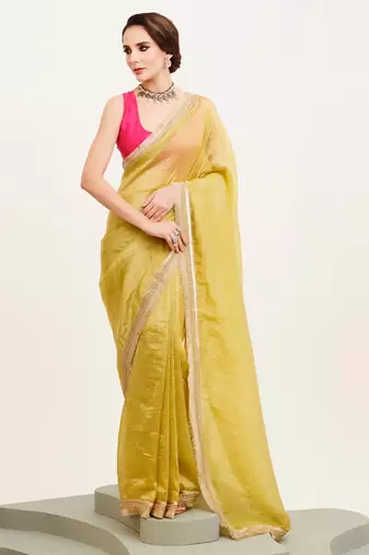 Yellow sequinned designer saree with blouse