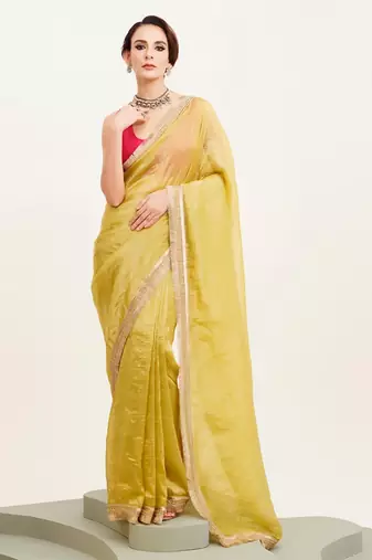 Yellow sequinned designer saree with blouse