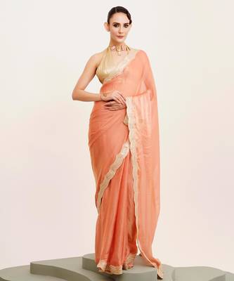 Peach solid satin saree with embellished border 1