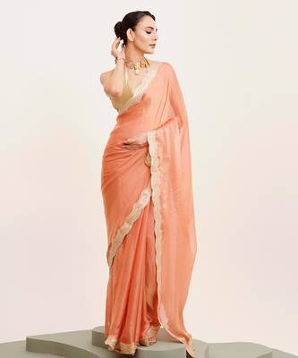 Peach solid satin saree with embellished border 2