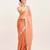 Peach solid satin saree with embellished border
