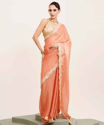 Peach solid satin saree with embellished border 4