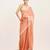 Peach solid satin saree with embellished border