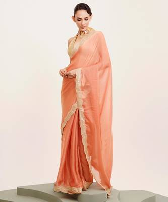 Peach solid satin saree with embellished border 5