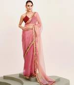 Peach designer tissue saree with blouse