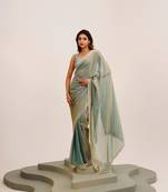 Metallic embellished beads and stones satin saree with blouse