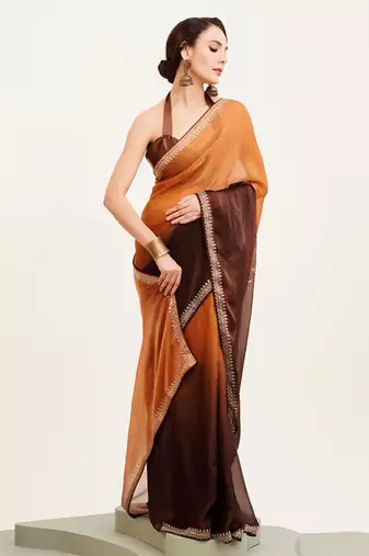 Brown ombre dyed beads and stone embellished saree with blouse