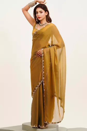 Rust embellished beads and stones satin saree with  blouse