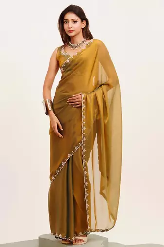 Rust embellished beads and stones satin saree with  blouse