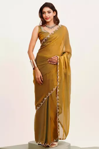 Rust embellished beads and stones satin saree with  blouse