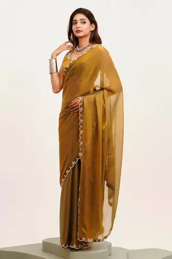 Rust embellished beads and stones satin saree with  blouse