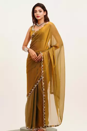 Rust embellished beads and stones satin saree with  blouse