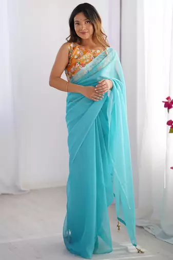 Blue organza saree with blouse