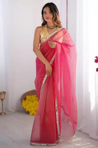 Pink embellished mirror work organza saree with blouse