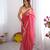 Pink embellished mirror work organza saree with blouse
