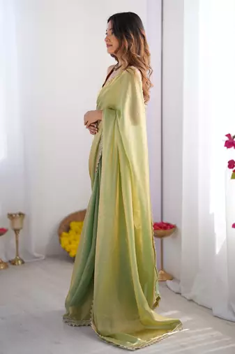 Metallic green tissue saree with unstitched blouse piece