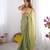 Metallic green tissue saree with unstitched blouse piece