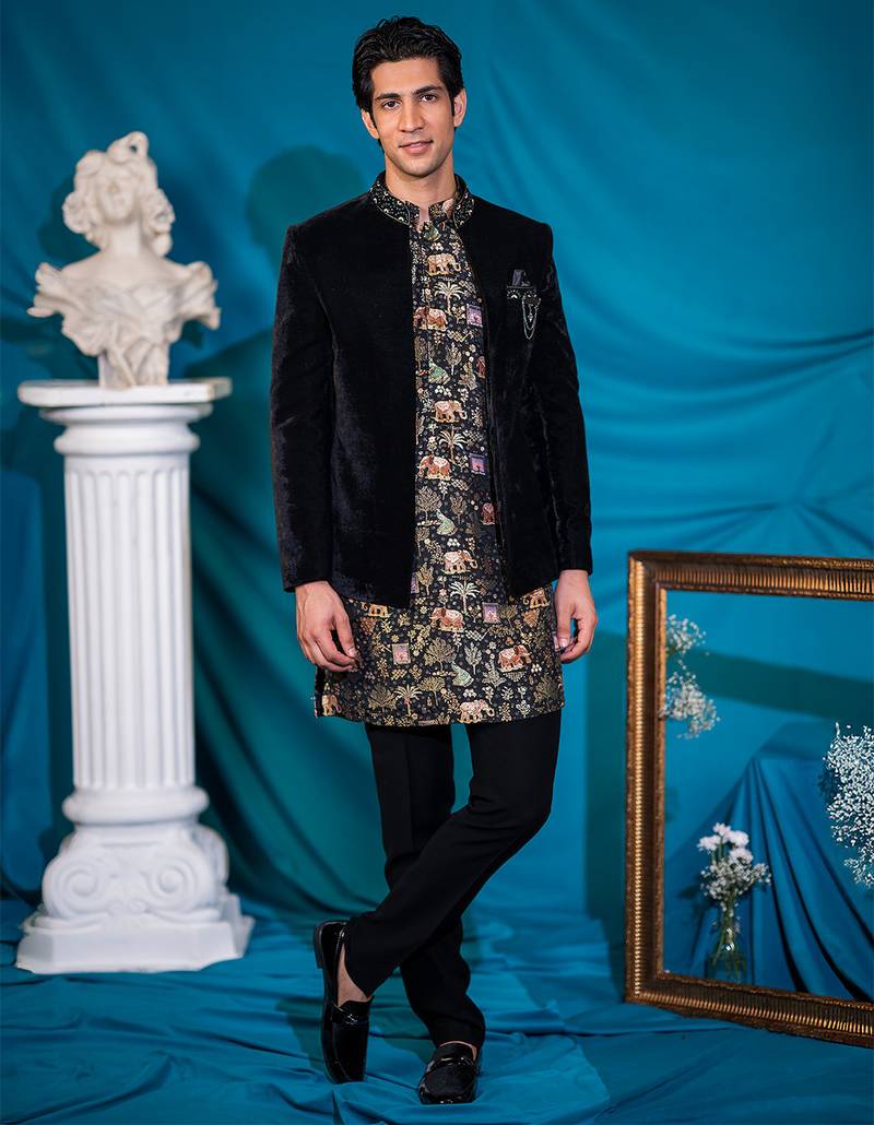 Embroidered black velvet jodhpuri suit with silk kurta