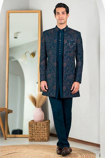 Peacock green indowestern with tranquil nature detailing thread and stone work