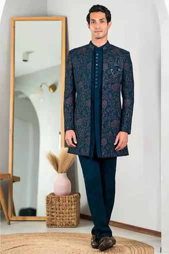 Peacock green indowestern with tranquil nature detailing thread and stone work