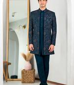 Peacock green indowestern with tranquil nature detailing thread and stone work